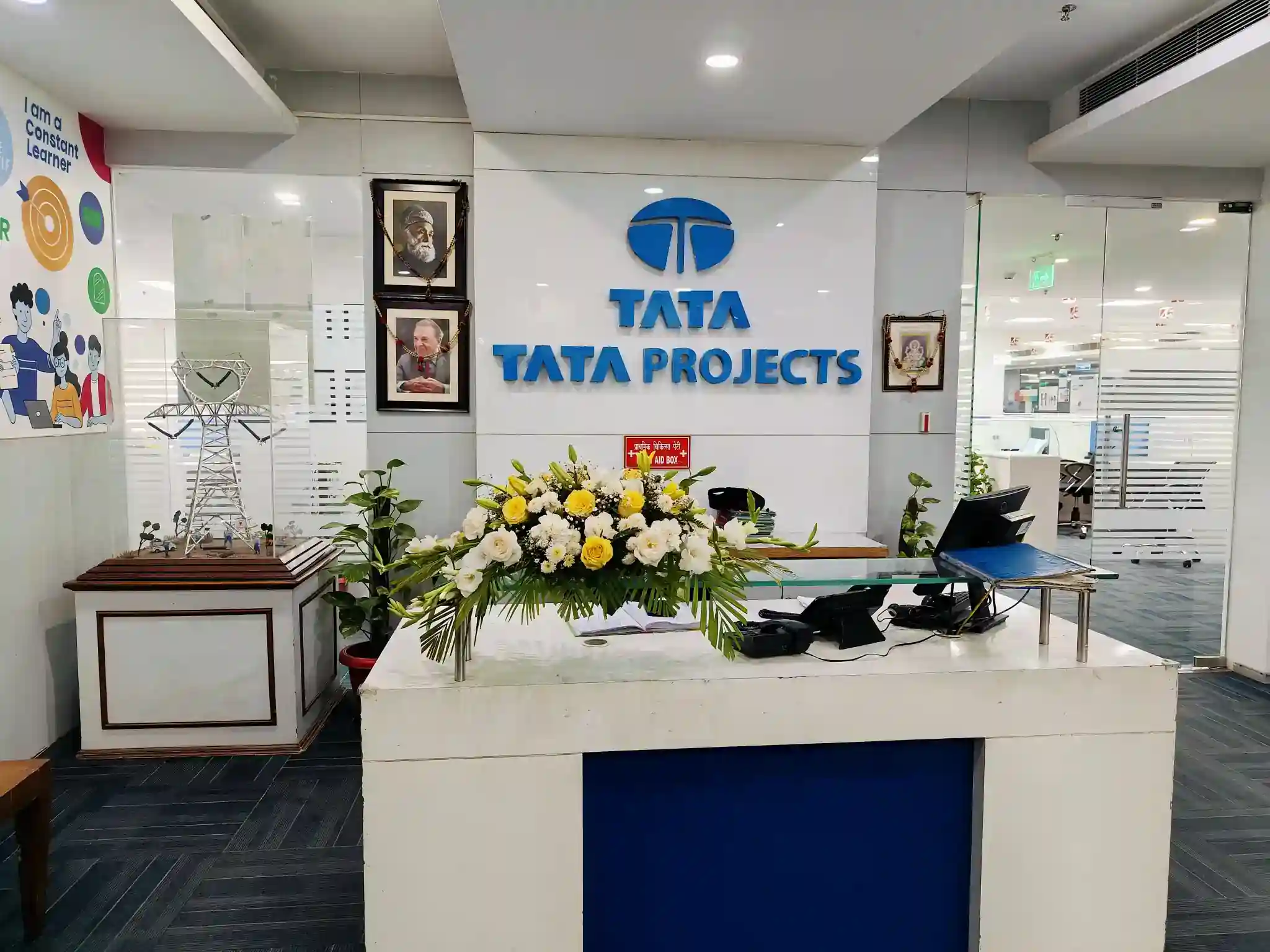 Modern corporate office reception area with branded company signage, professional workspace setup, and welcoming front desk showcasing a trusted business environment and strong corporate identity.