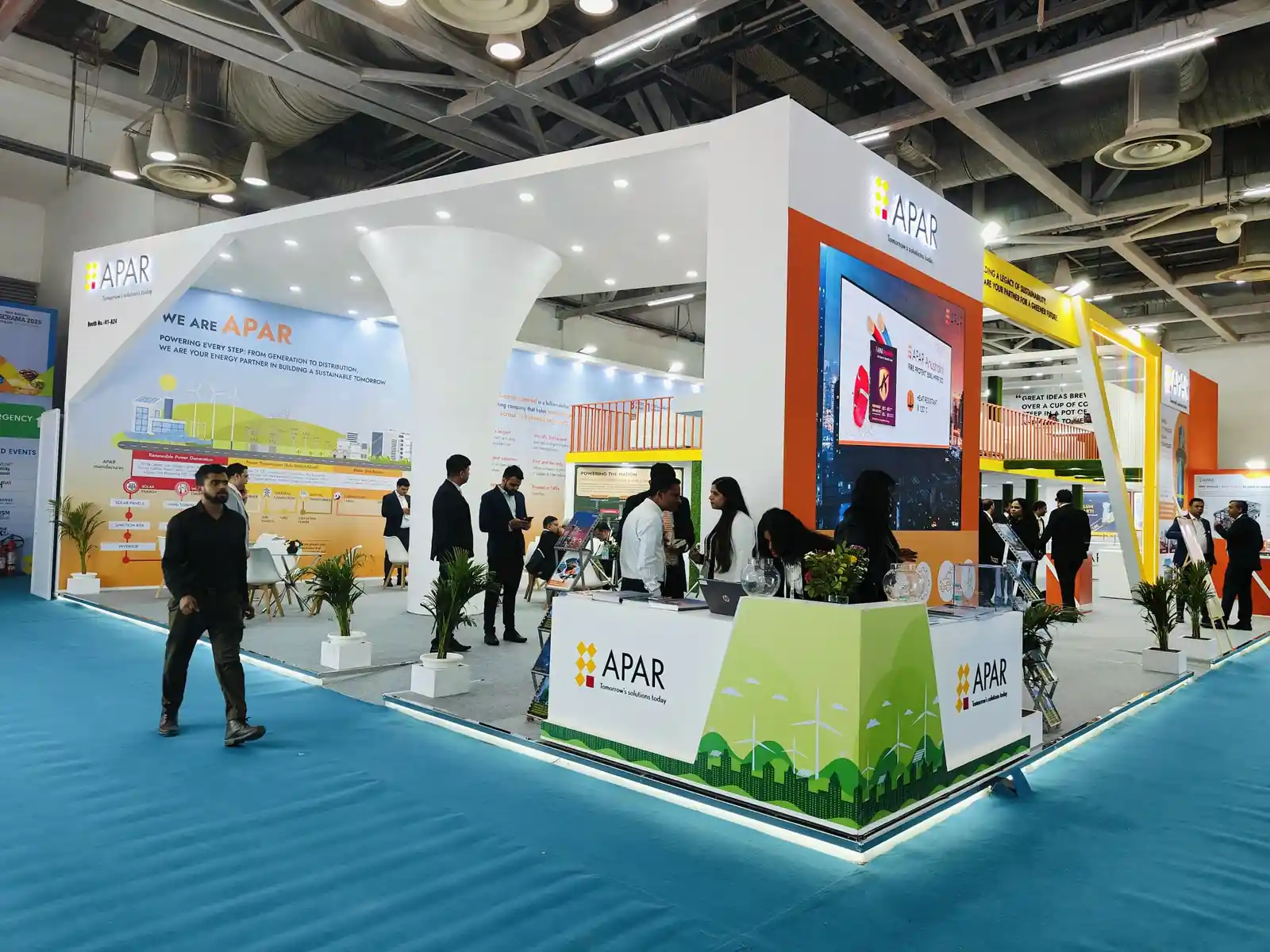 Large custom exhibition booth showcasing branded displays, LED screens, and interactive experience zones designed by professional exhibition stand builders to maximize brand visibility, engagement, and lead generation at trade shows and expos.